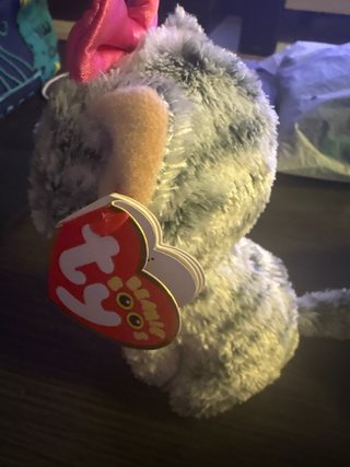 Peluche gato gris con lazo rosa