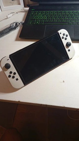 Nintendo Switch OLED + 6 juegos