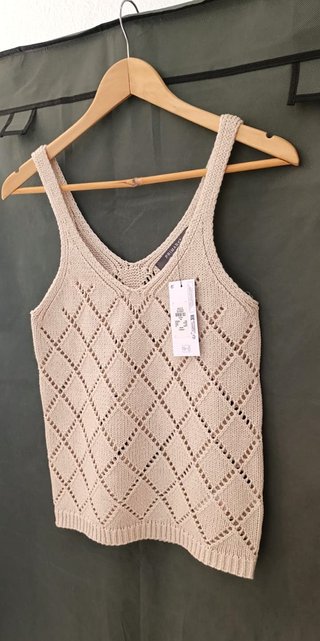Top sin mangas. De punto calado o crochet. Nuevo s