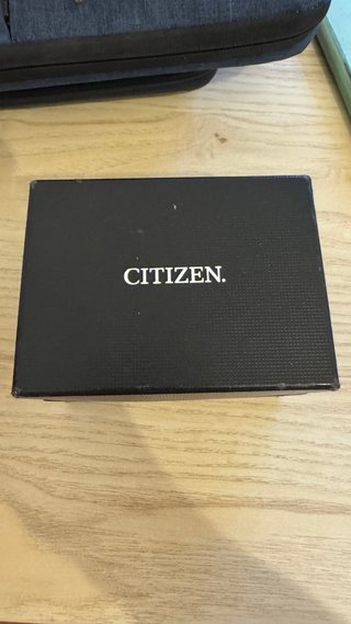 Reloj Citizen Eco-Drive Negro y Dorado