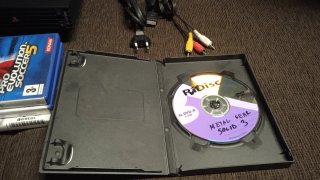 Consola PlayStation 2 Negra + Caja y Juegos