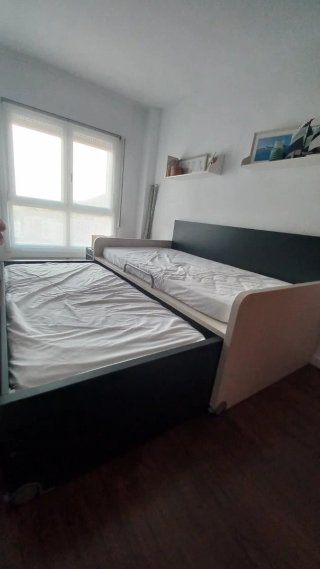 Cama nido sin uso con colchón.