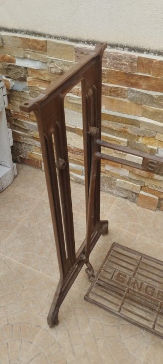 Pie de máquina de coser Singer