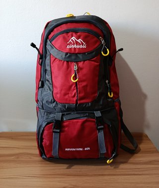 Mochila 60L impermeable roja para viaje nueva