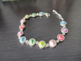 Pulsera y pendientes florales multicolor