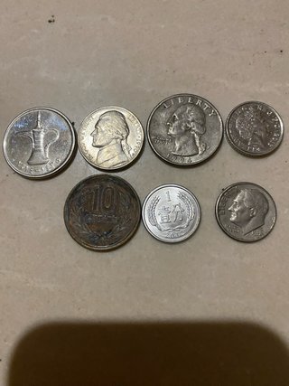 Lote 7 monedas diferentes países