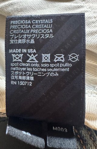 Pantalón vaquero desgastado y roto
