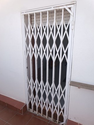 Reja ballesta abatible