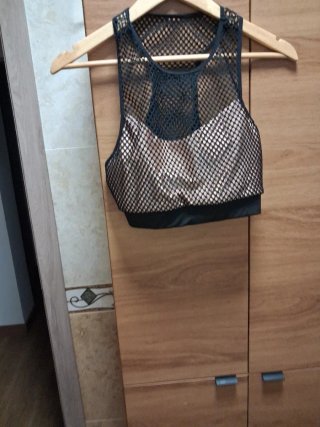 Sujetador deportivo malla negro y dorado Talla L