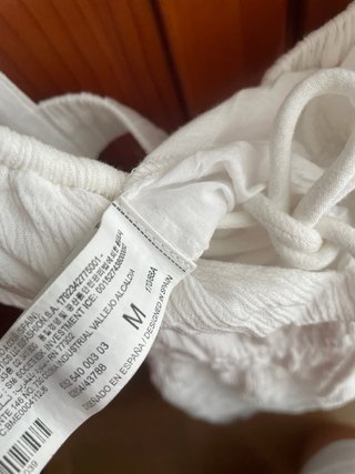 Vestido blanco corto con cordones