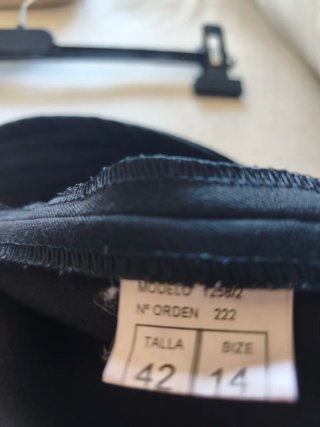 Pantalón negro cintura alta pata ancha