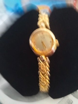 Orologio donna Kélia dorato con zirconi e rubini