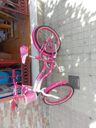 Bicicleta niña rosa con cesta