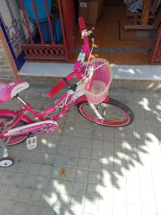 Bicicleta niña rosa con cesta