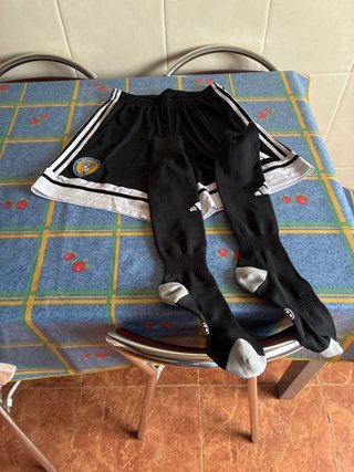 Pantalón y medias de entreno Olímpico de León