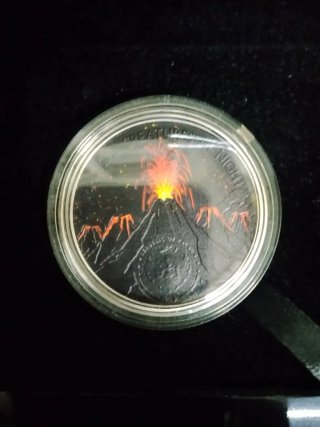 Moneda coleccionable ave fénix