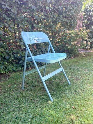 Silla metálica plegable color verde azulado