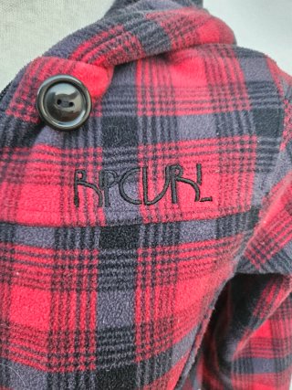 Chaqueta Rip Curl cuadros rojo y negro