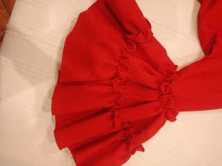 Traje de flamenca rojo con volantes