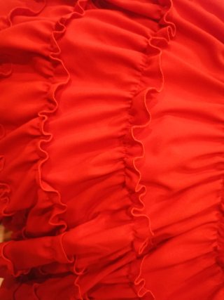 Traje de flamenca rojo con volantes