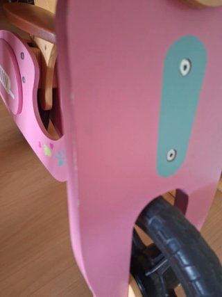 Bicicleta de madera rosa