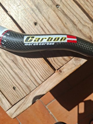 Manillar MEREK Carbon 64.5cm 31.8mm Doble Altura