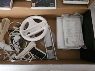 Consola Nintendo Wii + Juegos y Accesorios