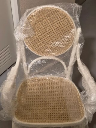 Sedia a dondolo in rattan naturale
