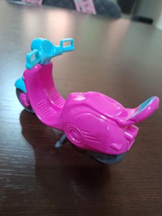 Ciclomotor rosa y azul para muñecas