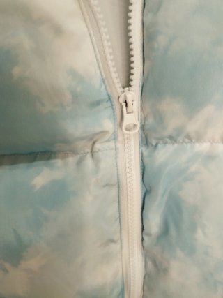 Plumas azul y blanco