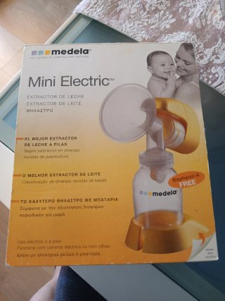 Sacaleches Mini Electric Medela mas un biberón