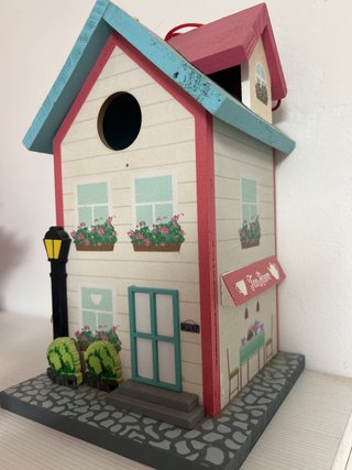Casa para pájaros decorativa