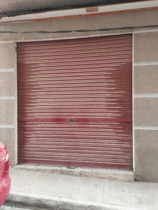 Cortina enrollable metálica con cerradura