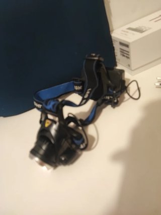 Linterna frontal LED Zoom + Cargador