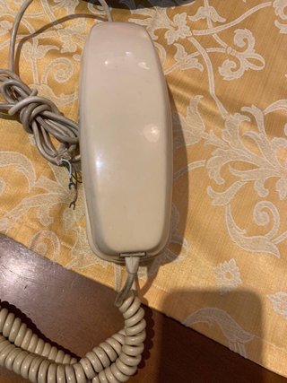 Teléfono antiguo vintage beige