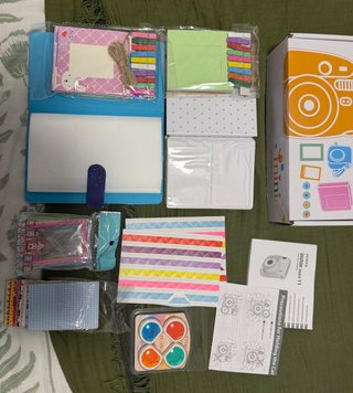 Pacchetto Fujifilm Instax Mini 11 + Mini 7S + accessori