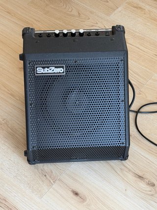Batería Electrónica Alesis Nitro + Ampli
