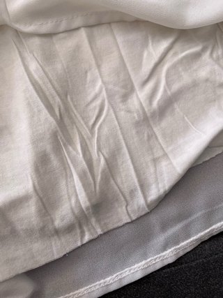 Blusa blanca con volantes
