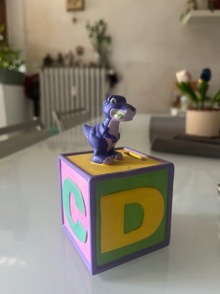 Salvadanaio cubo dinosauro