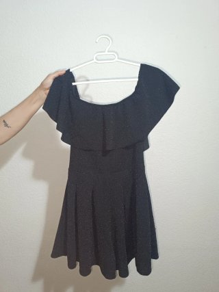 Mono negro con brillo y volante