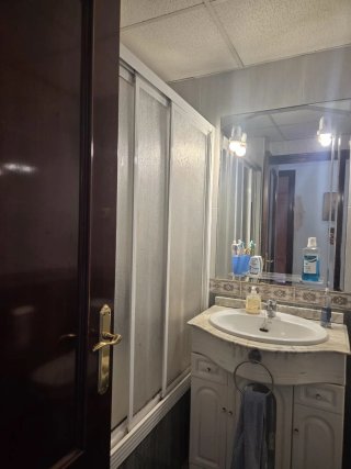 Piso de tres dormitorios