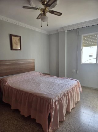 Piso de tres dormitorios