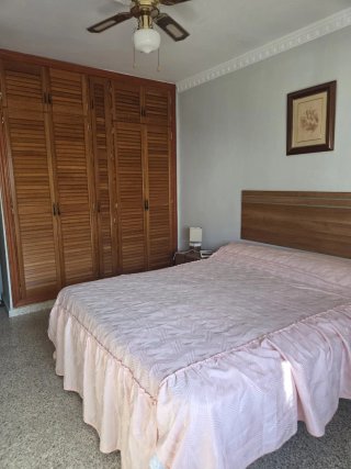 Piso de tres dormitorios