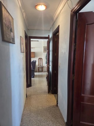 Piso de tres dormitorios