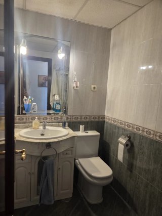 Piso de tres dormitorios