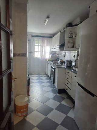 Piso de tres dormitorios