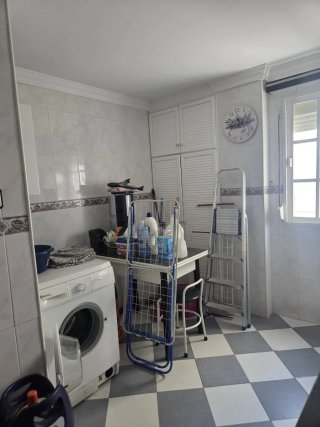Piso de tres dormitorios