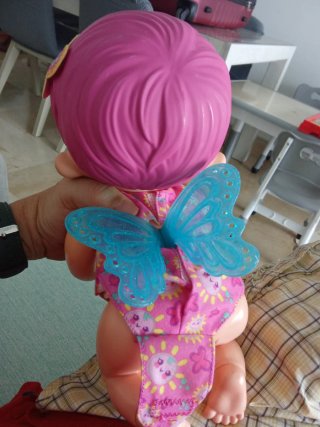 Muñeca Cry Babies con vestido rosa