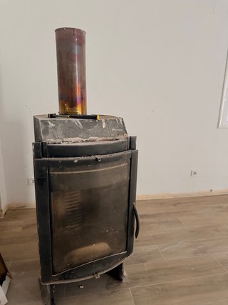 Casete de chimenea metálico y cristal