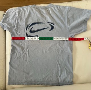 Camiseta Nike azul claro con logo